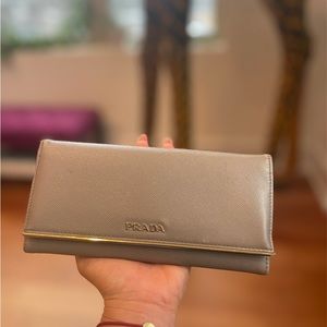 Prada long bi-fold Wallet in Saffiano leather.